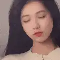 Woman opening eyes and smiling