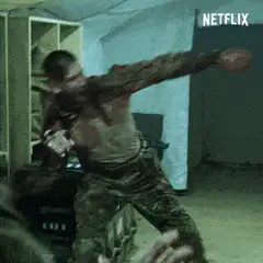 Bloodied soldier dancing in a tent