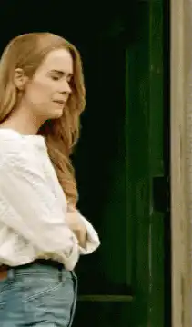 Woman turns and walks away