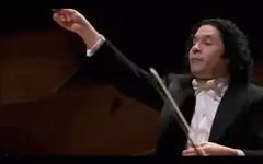 Conductor reaching out hand