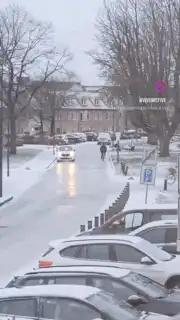 Cyclist slips on icy road