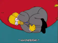 Homer Simpson whimpering on the floor