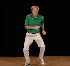 Man in green shirt dancing