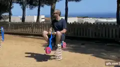 Man on playground spring rider
