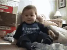 Baby laughing and falling over
