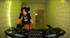 DJ girl with pigtails dancing