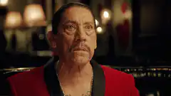 Danny Trejo looks surprised then eats