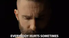 Guy looking down then up with text