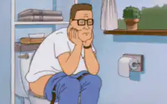Bored man on toilet