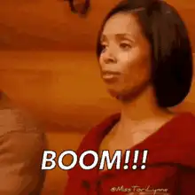 Woman saying boom with finger guns