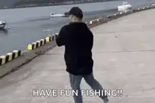Man fishing boat with fishing rod