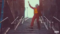 Joker dancing on stairs