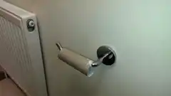 Toilet paper roll spins on holder