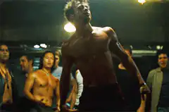 Paulie Walnuts flexing muscles