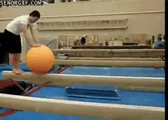 Gymnast fails to balance on ball