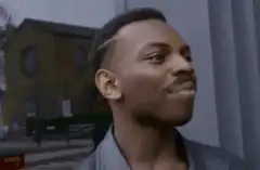 Man tapping his temple thinking