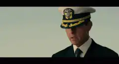 Tom Cruise saluting in uniform