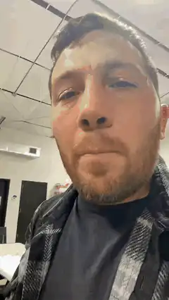 Man looking up with a blank stare