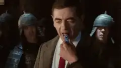 Mr. Bean eats spicy candy and breathes fire