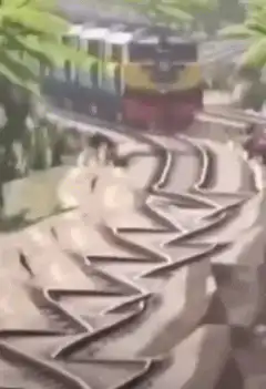 Train on zigzag railway tracks