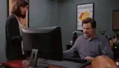 Ron Swanson throws computer in dumpster