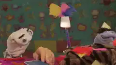 Puppet with glasses looks shocked