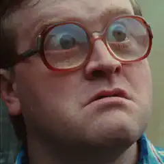 Man with glasses eyes pop out