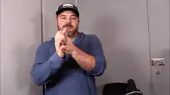 Man throws crumpled paper into trash