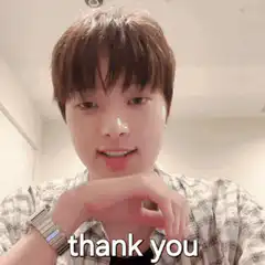 Young man smiling and saying thank you
