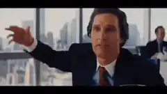 Gordon Gekko gestures in office