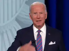 Joe Biden salutes