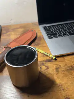 Crayon in a metal cup