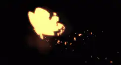 Yellow butterfly disintegrating into embers
