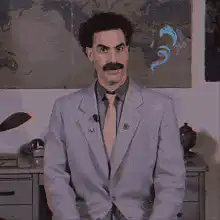 Borat smiling and nodding