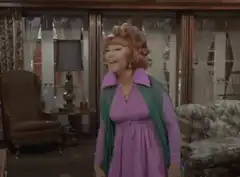 Lucy Ricardo throws a green shawl
