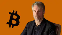 Sam Bankman-Fried with Bitcoin logo
