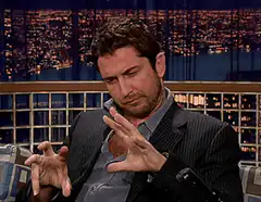 Gerard Butler making a disgusted face