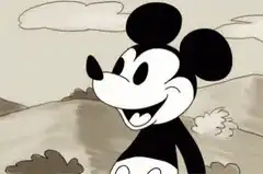 Mickey Mouse gets hit in the face