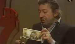 Man holding burning 1000 peso bill