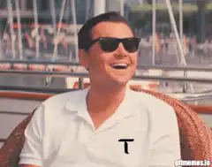 Tom Selleck laughing on a boat
