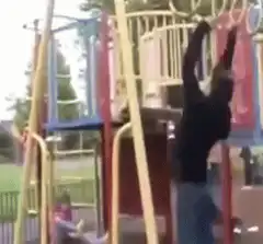 Man falls off playground monkey bars
