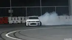 White car drifting on track