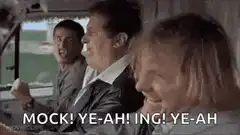 Three men singing in a car