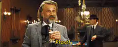 Christoph Waltz raises glass Prost!
