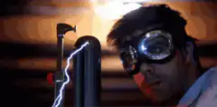 Man in goggles watching electricity arc