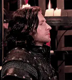 Boromir looks down in disappointment