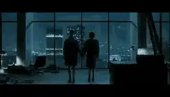 Couple watching city explosion