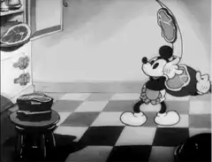 Mickey Mouse juggling steaks