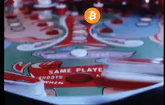 Bitcoin symbol on pinball machine