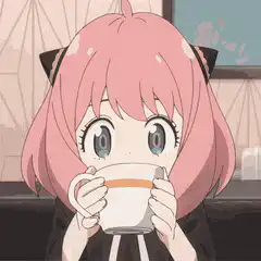 Anya drinking tea and smiling